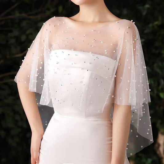 Ivory beaded bridal cape shrug in sheer tulle with pearl-like bead trim