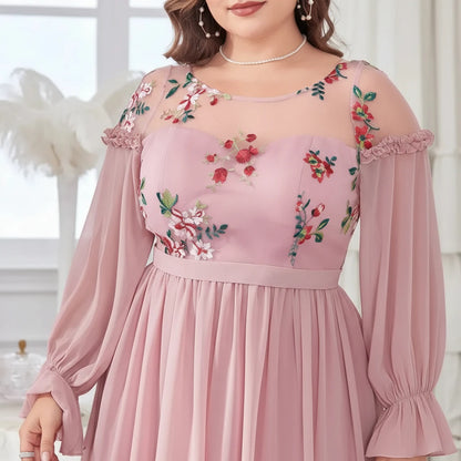 Pink chiffon evening dress with colorful floral chest design and flowing pleated skirt