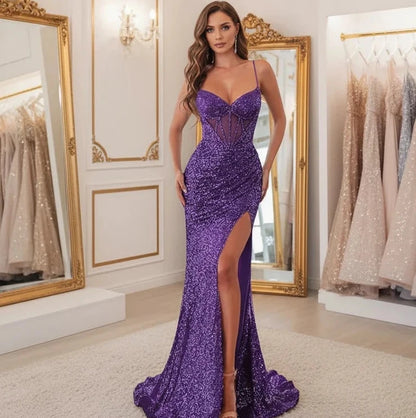 Purple sequin mermaid dress with spaghetti straps, sweetheart neckline, and front side slit.