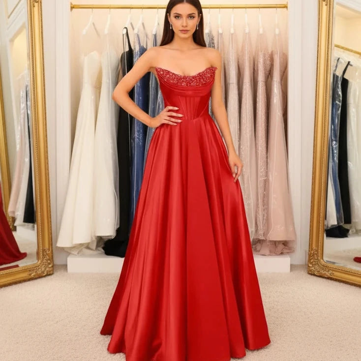 Red strapless beaded satin A-line evening gown with sparkling neckline trim