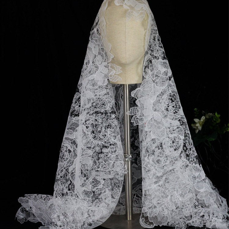Ivory French lace wedding veil on mannequin, long sheer drape with floral scallops