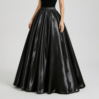 Glossy satin maxi skirt in black with elastic waistband and gathered pleat texture