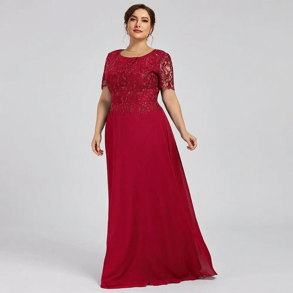 Red lace A-line dress with short sleeves and long flowing skirt
