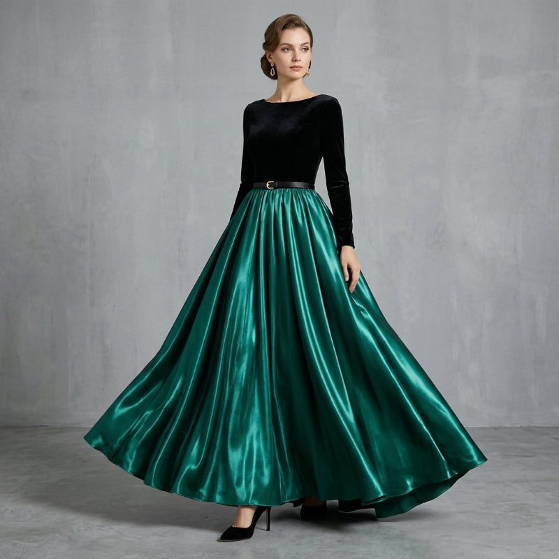 Glossy satin maxi skirt in emerald green with elastic waistband and pleated full flare