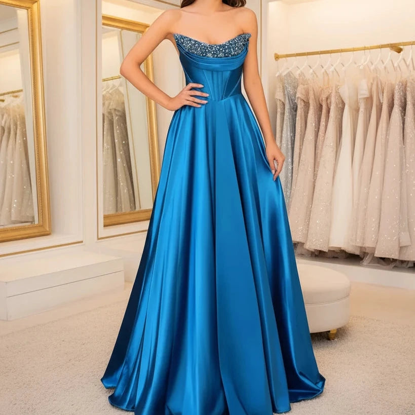 Blue strapless beaded satin A-line evening gown with sparkling neckline trim