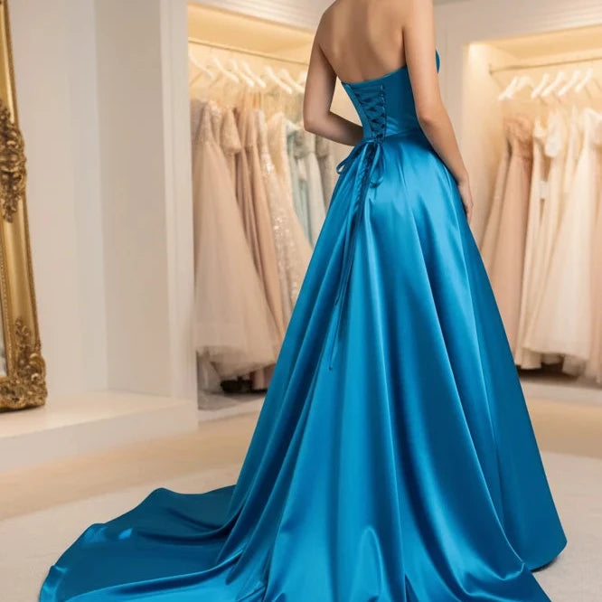 Blue strapless beaded satin A-line evening gown with full flared skirt