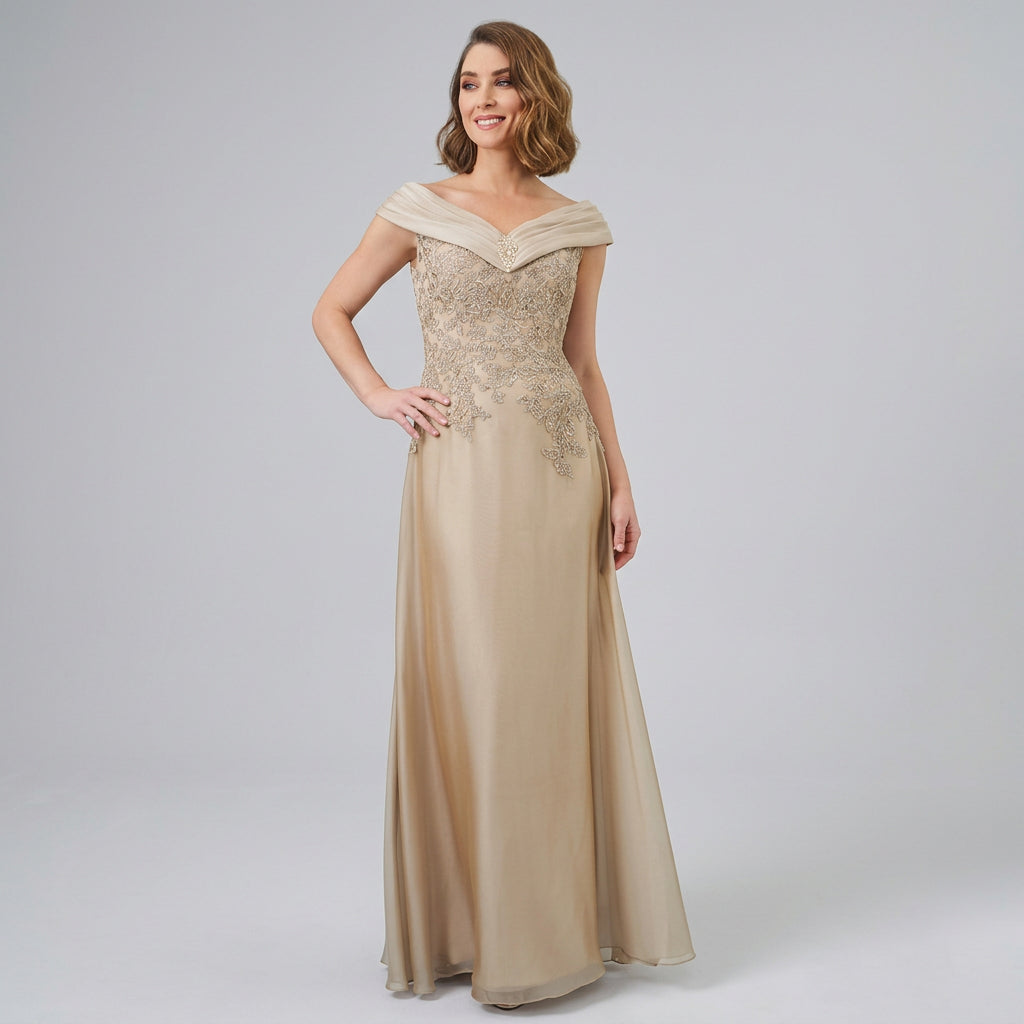 Champagne off-shoulder satin gown with pleated neckline and embellished bodice