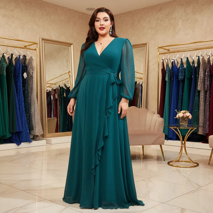 Teal chiffon crossover maxi dress with V-neck, long puff sleeves, and draped wrap bodice