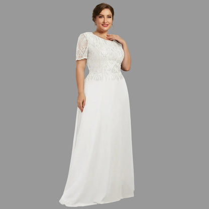White lace A-line dress with short sleeves and long flowing skirt