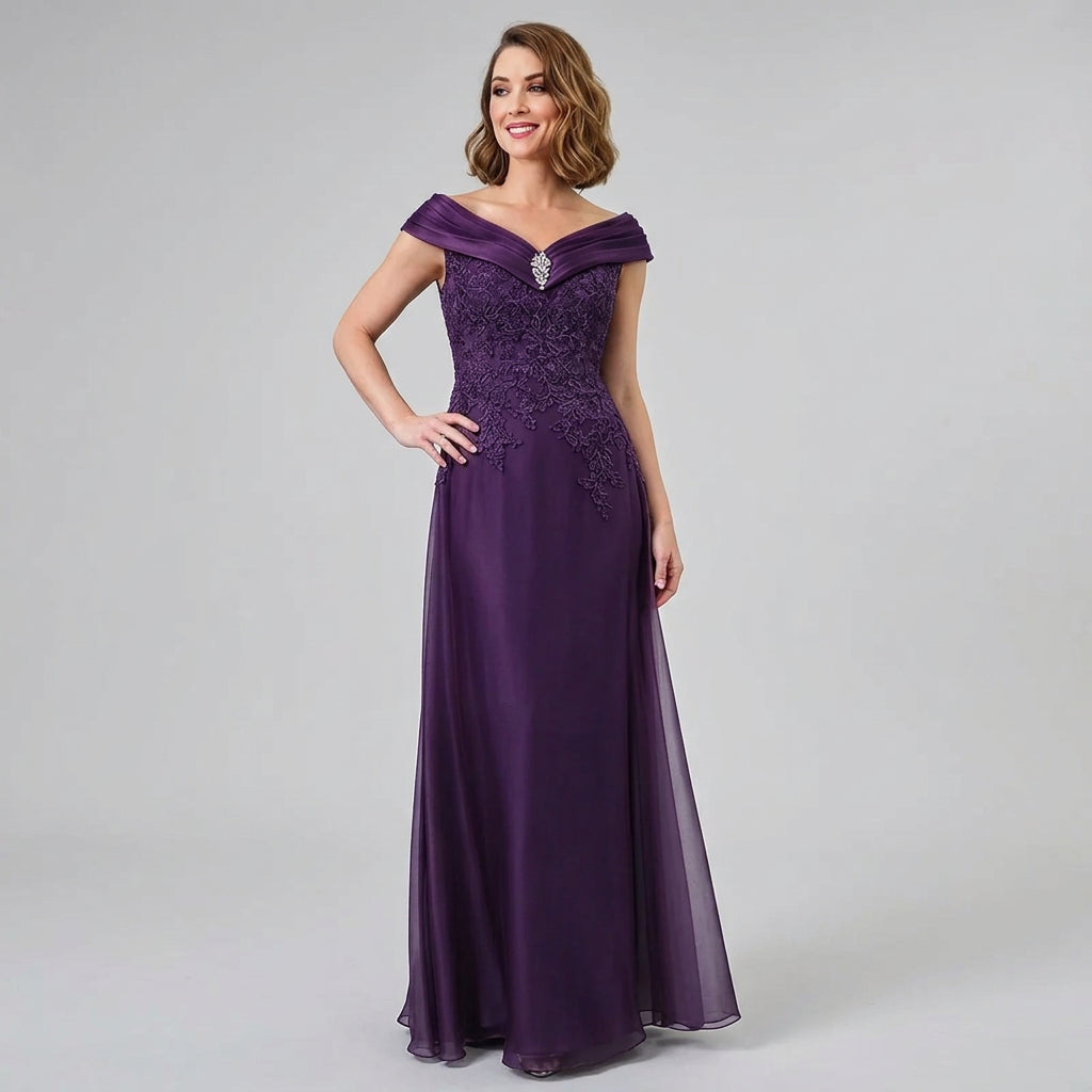 Plum off-shoulder satin gown with embroidered bodice and flowing pleated skirt