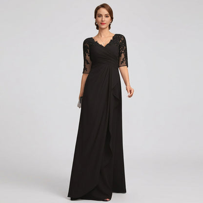 Black lace applique chiffon gown with V-neck, short sleeves, and flowing draped skirt