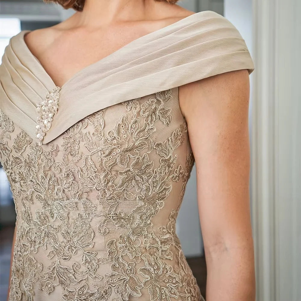 Champagne off-shoulder satin bodice with floral lace embroidery and draped neckline