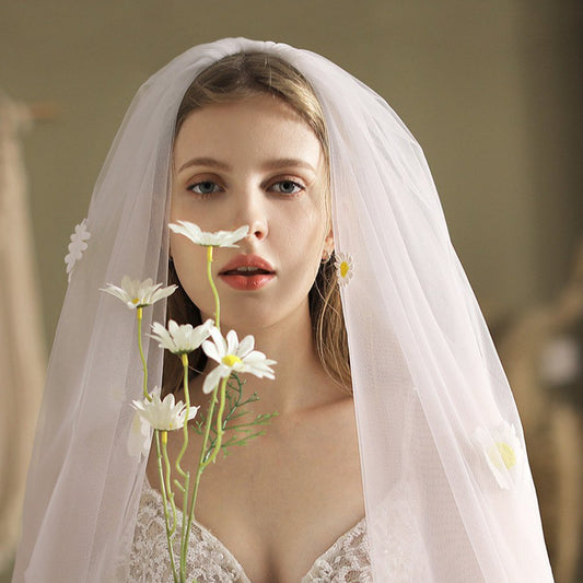 Ivory short bridal veil with small daisy flowers on sheer tulle edge