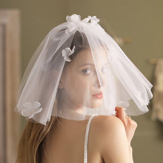 Ivory short wedding veil with layered tulle and 3D flower appliques across top