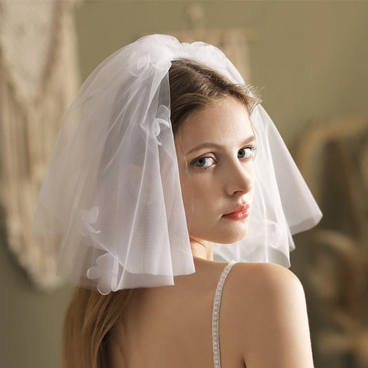 Ivory short wedding veil with scalloped flower details and soft draped tulle