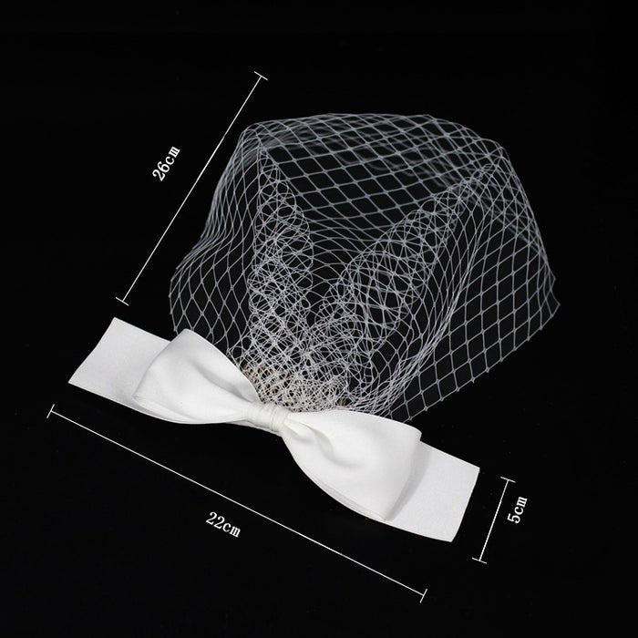 White birdcage veil headband with bow, shown with size measurements