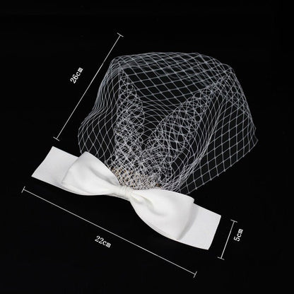 White birdcage veil headband with bow, shown with size measurements