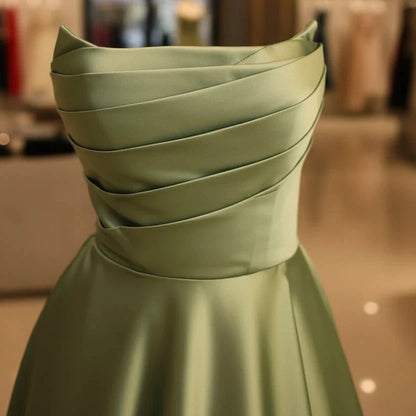Green strapless satin A-line dress with sweetheart neckline and side slit