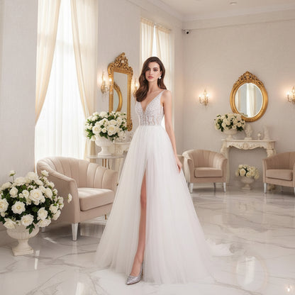 White V-neck tulle formal gown with pearl-crystal beaded bodice and long skirt slit