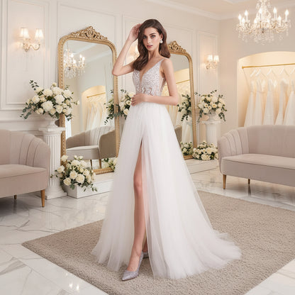 White V-neck tulle formal gown with beaded pearl crystal bodice and front leg slit